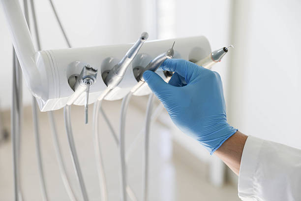 Professional Tooth Extraction technician working in North Aurora, IL